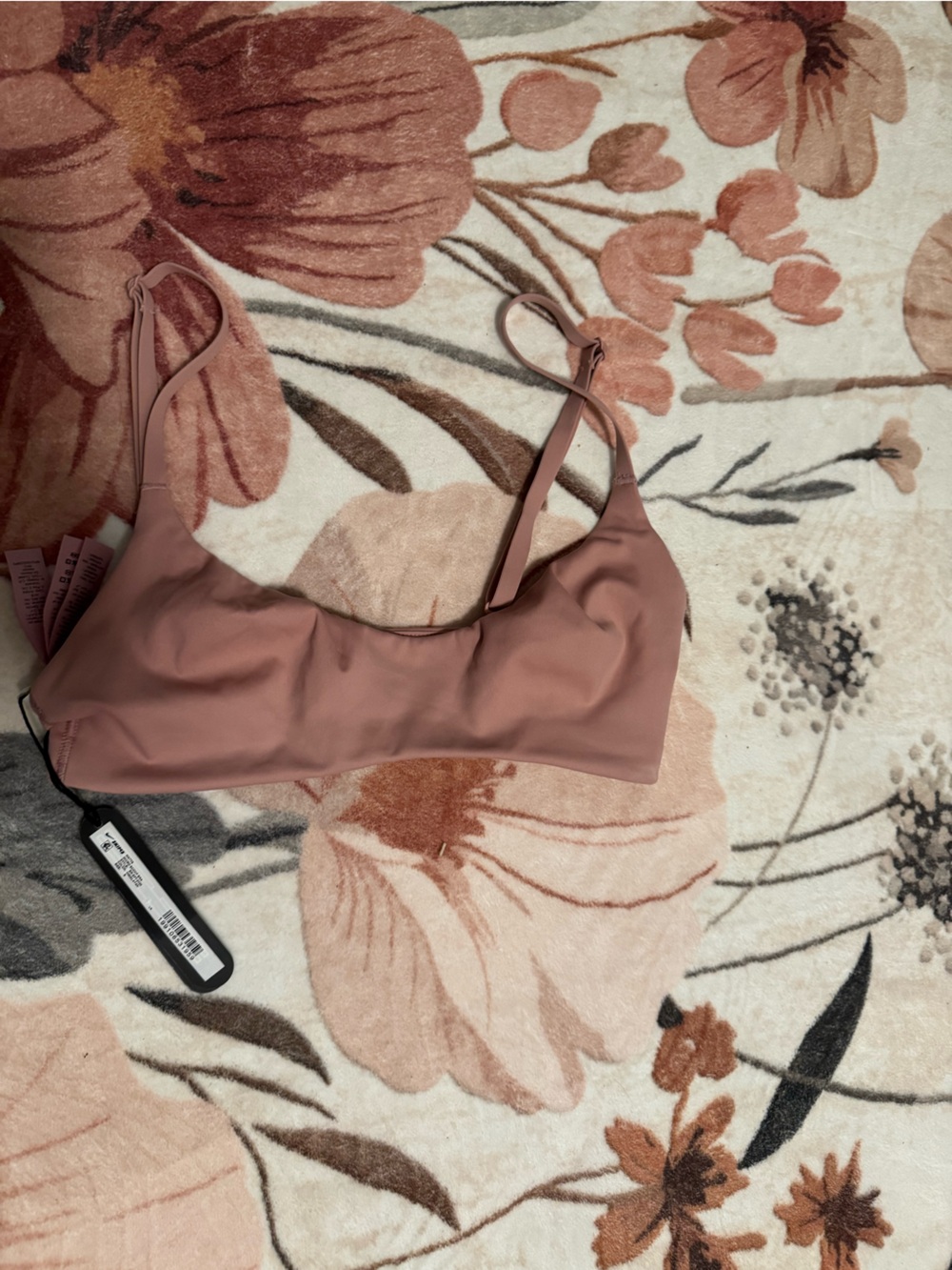 SKIMS Nike Soft Sports Bra Bandeau in Dusty Rose